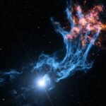 'Hand of God' nebula exposes hidden cosmic bones Deep space X-ray photography of MSH 15-52 pulsar wind nebula revealing electric blue gas filaments and fiery orange thermal knots against a dark space background